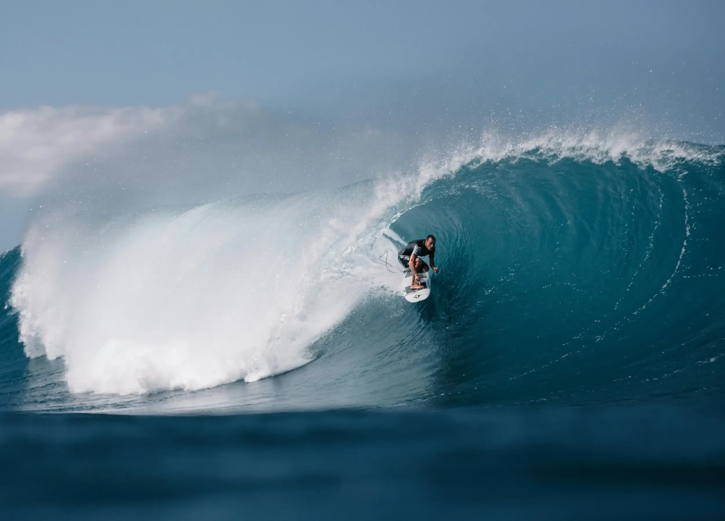 Surfer on the left-hand point break at Mompiche on Ecuador's northern Pacific coast